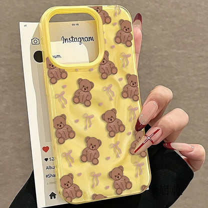A Cute And Sweet Heart-Shaped Folds Texture Phone Case For iPhone 17 Pro Max 16 Plus 15 14 13 12 11 16E With Bow Tie Bear Design